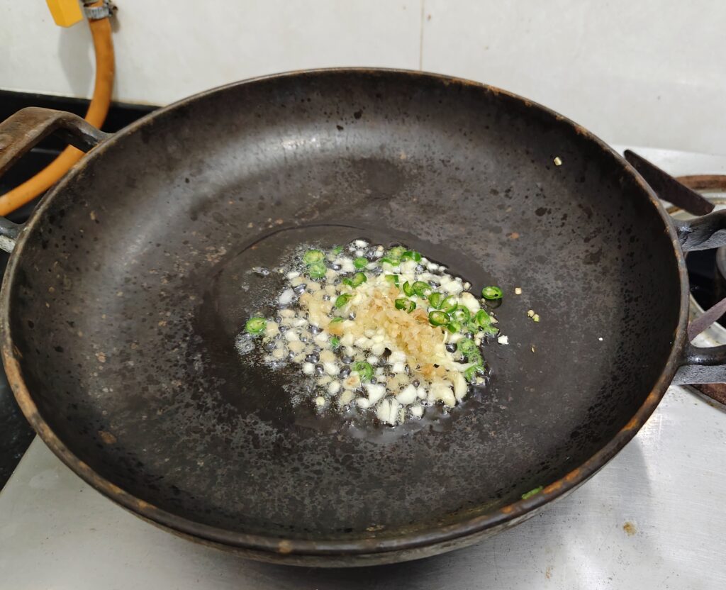 Green chillies, ginger and garlic sauteed