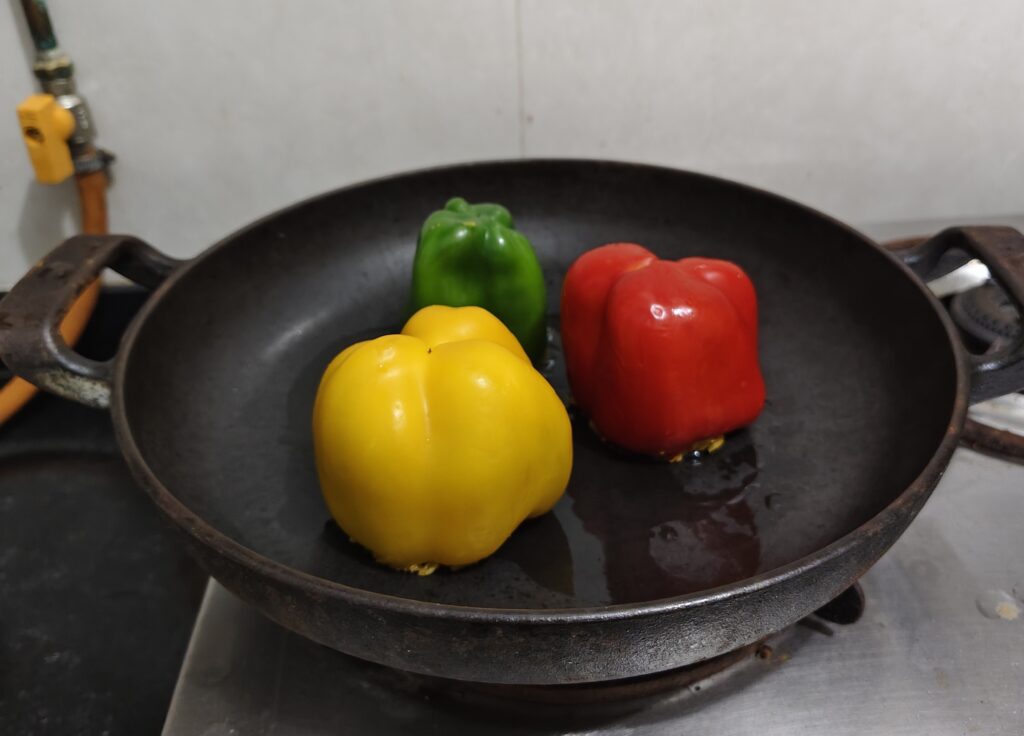 Place stuffed bell peppers upside down on pan