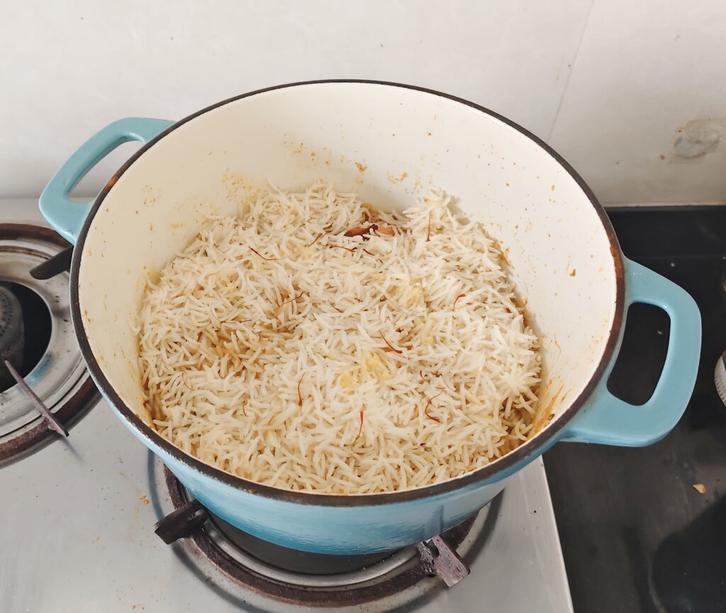 Add Half Cooked Basmati Rice