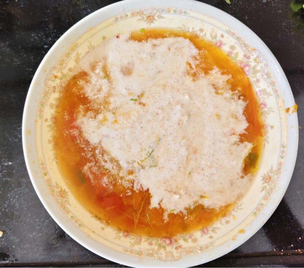 Add coconut paste to gravy