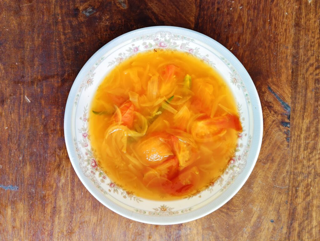 Peeled and boiled tomatoes and onions